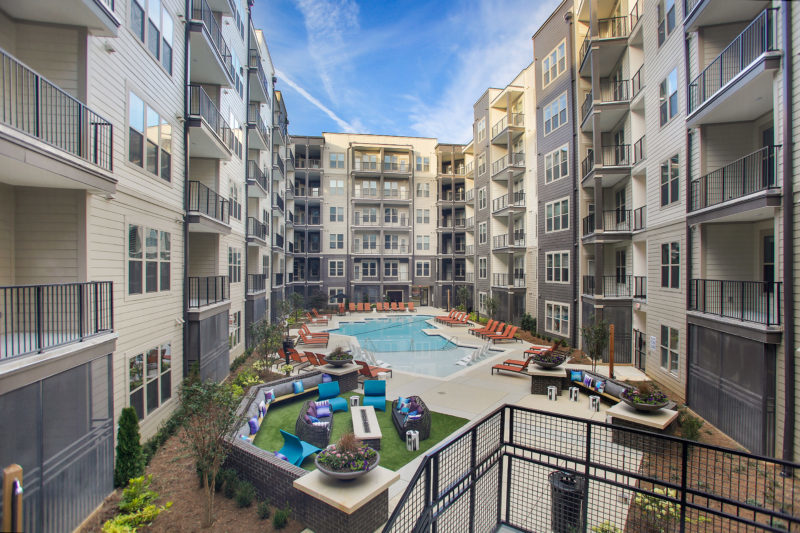 Helios - Balcony View of Pool, Outdoor Lounge And Grilling Area